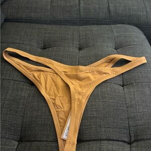 skims swim thong